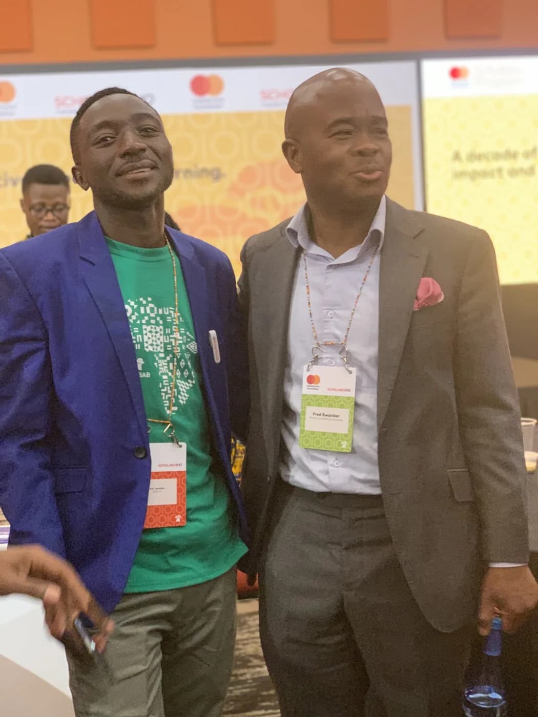 A second portrait of Eric with a fellow participant at an event